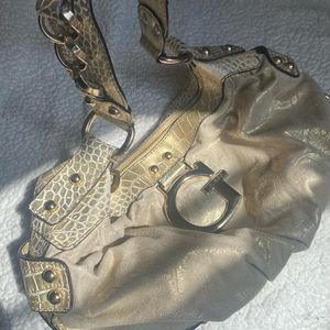 guess gold embossed logo baguette bag